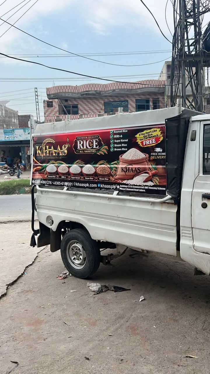The Khaas rice banner on the side of our pickup, photographed in Lahore